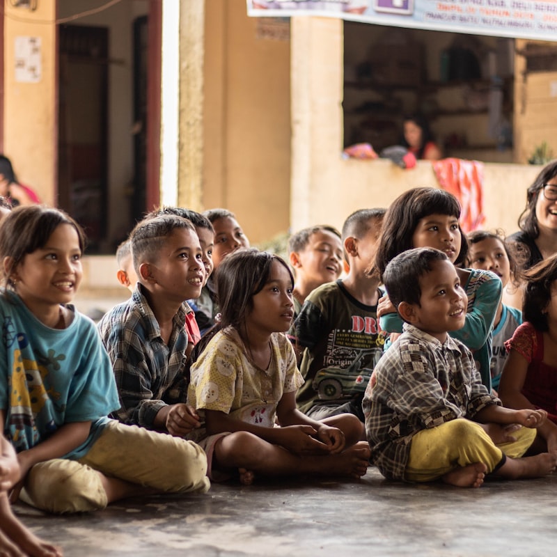 Volunteer reading to children